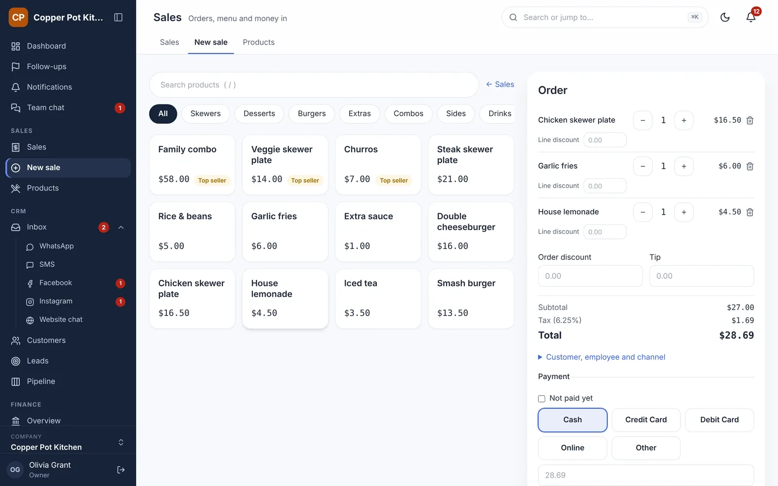 The point-of-sale screen with menu items and an order